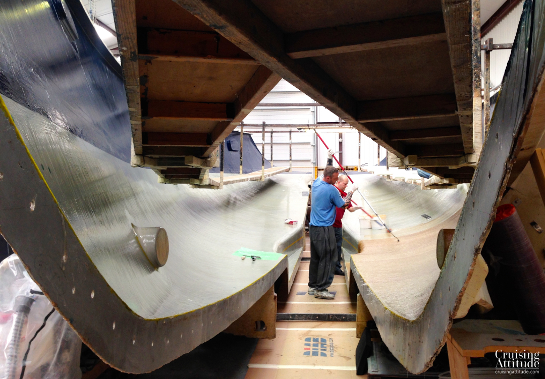 Gelcoat and epoxy layers finished - first layers of fibreglass go in the mould | Cruising Attitude Sailing Blog - Discovery 55