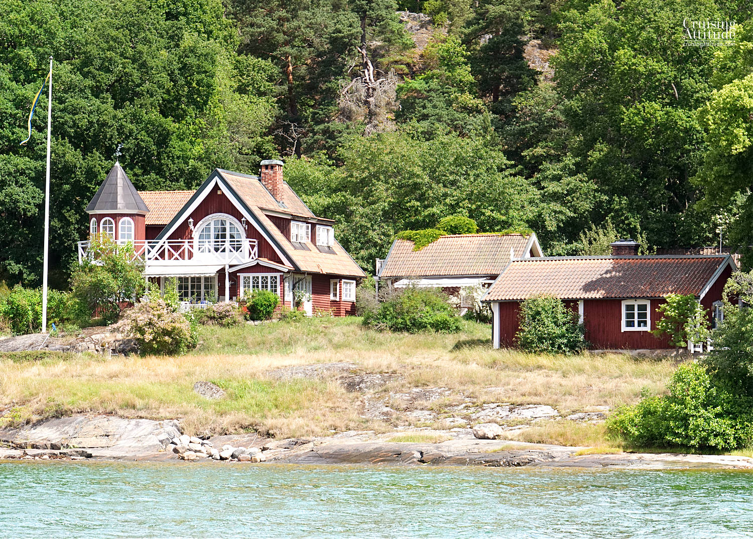 One of the many fairytale-like cottages you'll see on the way to Stockholm - Cruising Attitude Sailing Blog | Discovery 55